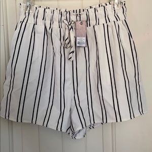 Black and white striped float shorts with pockets